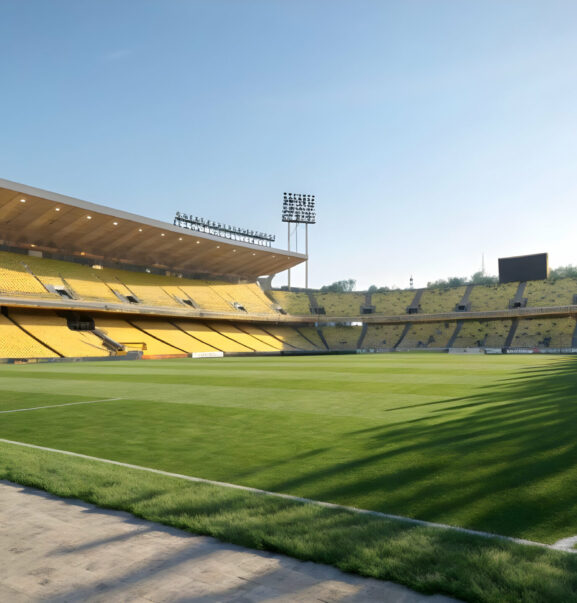 Empty soccer stadium on a sunny day with bright green grass and yellow seats Empty soccer stadium on a sunny day with bright green grass and yellow seats